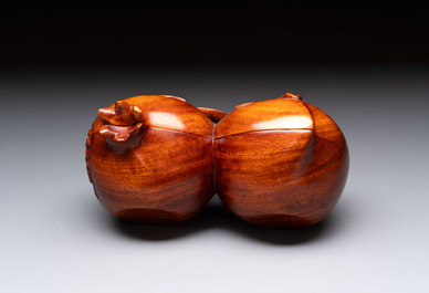 12 various Chinese carved huali and hongmu fruit-form covered boxes, 20th C.