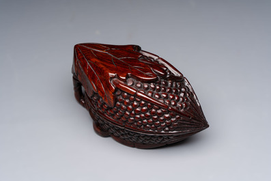 12 various Chinese carved huali and hongmu fruit-form covered boxes, 20th C.
