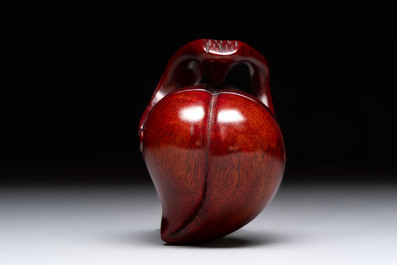 12 various Chinese carved huali and hongmu fruit-form covered boxes, 20th C.