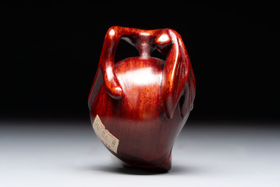 12 various Chinese carved huali and hongmu fruit-form covered boxes, 20th C.