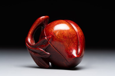 12 various Chinese carved huali and hongmu fruit-form covered boxes, 20th C.