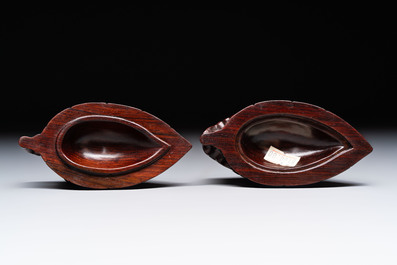 12 various Chinese carved huali and hongmu fruit-form covered boxes, 20th C.