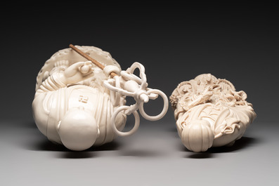 A Chinese Dehua blanc de Chine monk and a Guanyin, He Chaozong 何朝宗 and Dehua 德化 marks, 20th C.