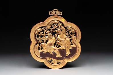 11 Chinese gilt-lacquered carved wooden panels with narrative design, 19th C.