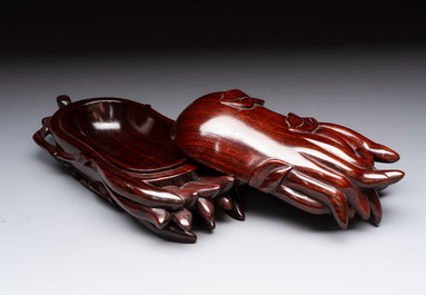 12 various Chinese carved huali and hongmu fruit-form covered boxes, 20th C.