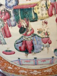 A large Chinese famille rose coral-red-ground fish bowl with narrative design, 19th C.