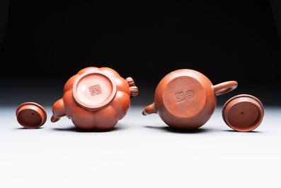 Seven Chinese Yixing stoneware teapots, two cups and a covered box, 20th C.