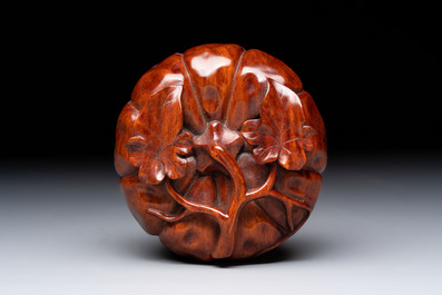 12 various Chinese carved huali and hongmu fruit-form covered boxes, 20th C.