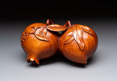 12 various Chinese carved huali and hongmu fruit-form covered boxes, 20th C.