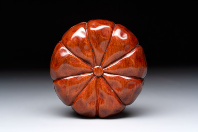 12 various Chinese carved huali and hongmu fruit-form covered boxes, 20th C.