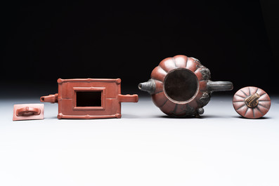 Seven Chinese Yixing stoneware teapots, two cups and a covered box, 20th C.
