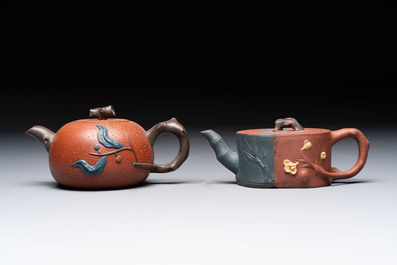 Seven Chinese Yixing stoneware teapots, two cups and a covered box, 20th C.