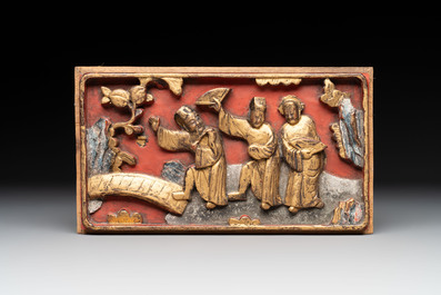 11 Chinese gilt-lacquered carved wooden panels with narrative design, 19th C.