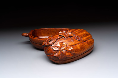 12 various Chinese carved huali and hongmu fruit-form covered boxes, 20th C.