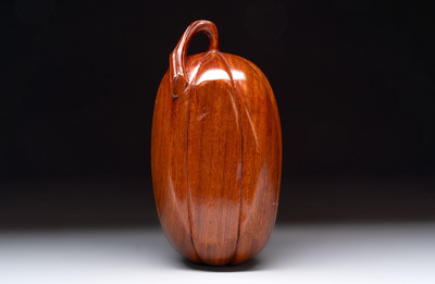12 various Chinese carved huali and hongmu fruit-form covered boxes, 20th C.