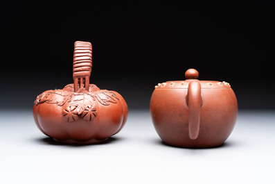 Seven Chinese Yixing stoneware teapots, two cups and a covered box, 20th C.