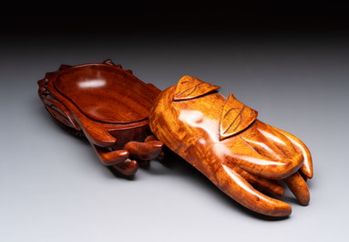12 various Chinese carved huali and hongmu fruit-form covered boxes, 20th C.