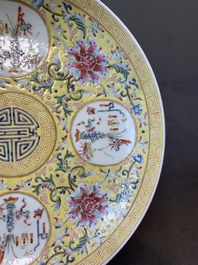 A Chinese famille rose yellow-ground 'Antiquities' plate, Guangxu mark, 19/20th C.