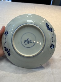 Seven Chinese blue and white plates with floral design, Kangxi