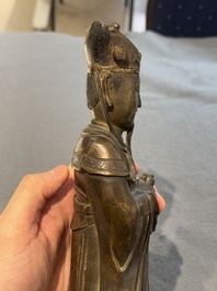 A Chinese bronze figure of an official, Ming