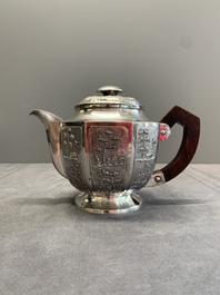 Two Vietnamese silver teapots and a covered sugar bowl, marked Donghung, ca. 1900