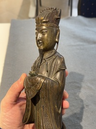 A Chinese bronze figure of an official, Ming