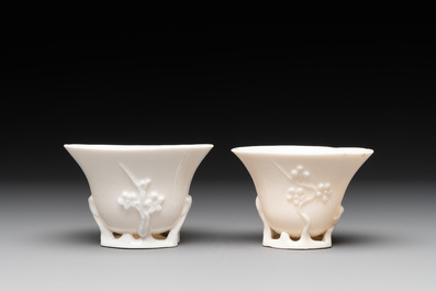 Two Chinese Dehua blanc de Chine wine cups and a figure of Liuhai, 18/19th C.