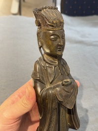 A Chinese bronze figure of an official, Ming