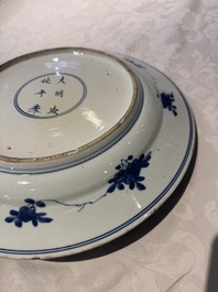 A pair of Chinese blue and white dishes with floral design, Chenghua mark, Kangxi