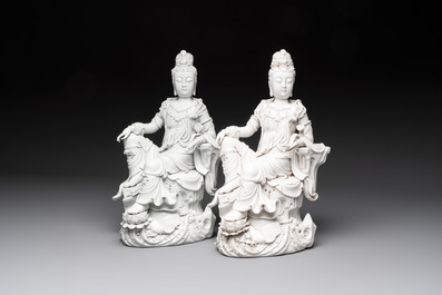 Two Chinese Dehua blanc de Chine sculptures of the seated Guanyin, He Chaozong 何朝宗 and Dehua 德化 marks, 20th C.