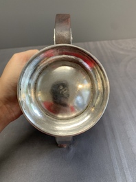 Two Vietnamese silver teapots and a covered sugar bowl, marked Donghung, ca. 1900