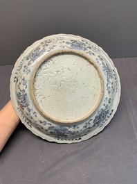 A Chinese blue and white 'phoenix' dish and two 'Buddhist lion' and 'peony' plates, Hongzhi/Zhengde