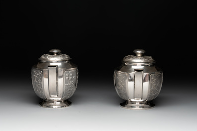 Two Vietnamese silver teapots and a covered sugar bowl, marked Donghung, ca. 1900