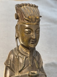 A Chinese bronze figure of an official, Ming