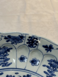 Seven Chinese blue and white plates with floral design, Kangxi