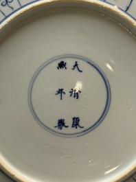 Seven Chinese blue and white plates with floral design, Kangxi