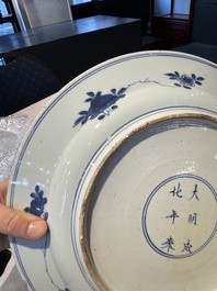 A pair of Chinese blue and white dishes with floral design, Chenghua mark, Kangxi