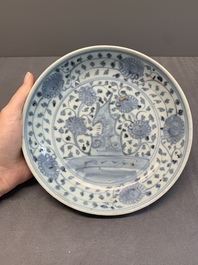 A Chinese blue and white 'phoenix' dish and two 'Buddhist lion' and 'peony' plates, Hongzhi/Zhengde