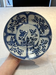 Seven Chinese blue and white plates with floral design, Kangxi