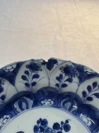 Seven Chinese blue and white plates with floral design, Kangxi