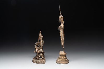 A bronze Simhanada Lokeshvara seated on a Buddhist lion and a Buddha, Southeast Asia, 19th C.