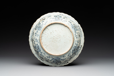 A Chinese blue and white 'phoenix' dish and two 'Buddhist lion' and 'peony' plates, Hongzhi/Zhengde
