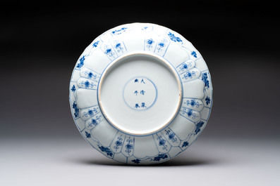 Seven Chinese blue and white plates with floral design, Kangxi