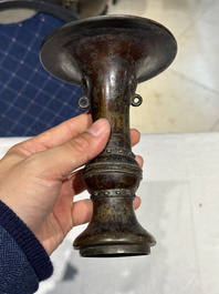 A Chinese bronze 'gu' vase and a bronze covered ewer for the Islamic market, Ming