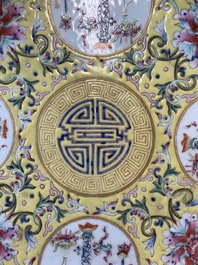 A Chinese famille rose yellow-ground 'Antiquities' plate, Guangxu mark, 19/20th C.