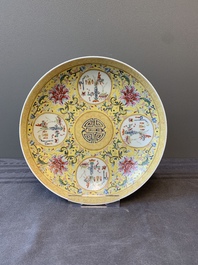 A Chinese famille rose yellow-ground 'Antiquities' plate, Guangxu mark, 19/20th C.