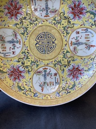 A Chinese famille rose yellow-ground 'Antiquities' plate, Guangxu mark, 19/20th C.