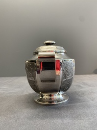 Two Vietnamese silver teapots and a covered sugar bowl, marked Donghung, ca. 1900