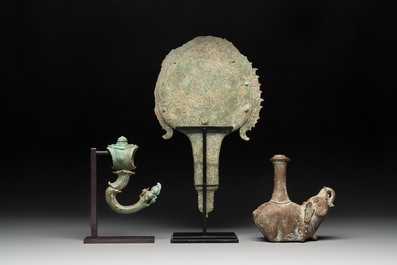 Three palanquin hooks, a bronze sculpture of naga Mucalinda and an elephant-form kendi, Cambodia, 13th C. and earlier