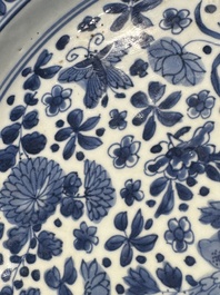 A pair of Chinese blue and white dishes with floral design, Chenghua mark, Kangxi